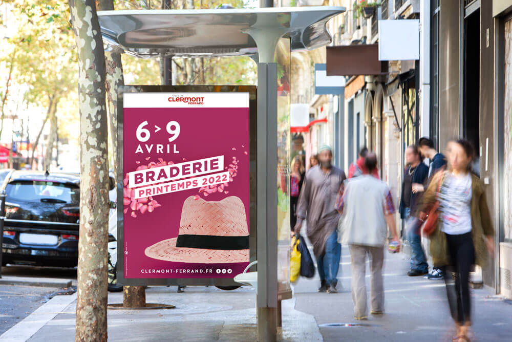 affiche de la braderie de clermont créé par l'agence com commerce